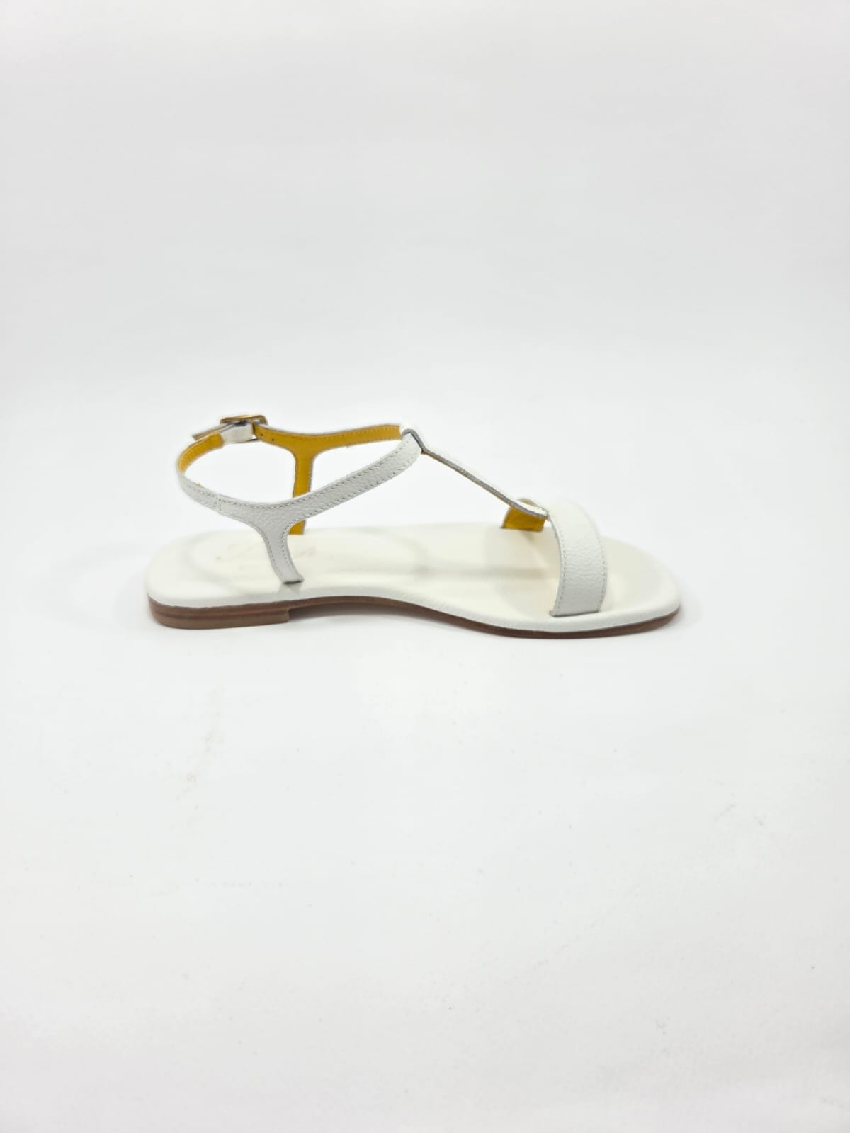 Sandali Donna con Cinturino Interamente in Vera Pelle Bianco con Suola in Cuoio Naturale.
