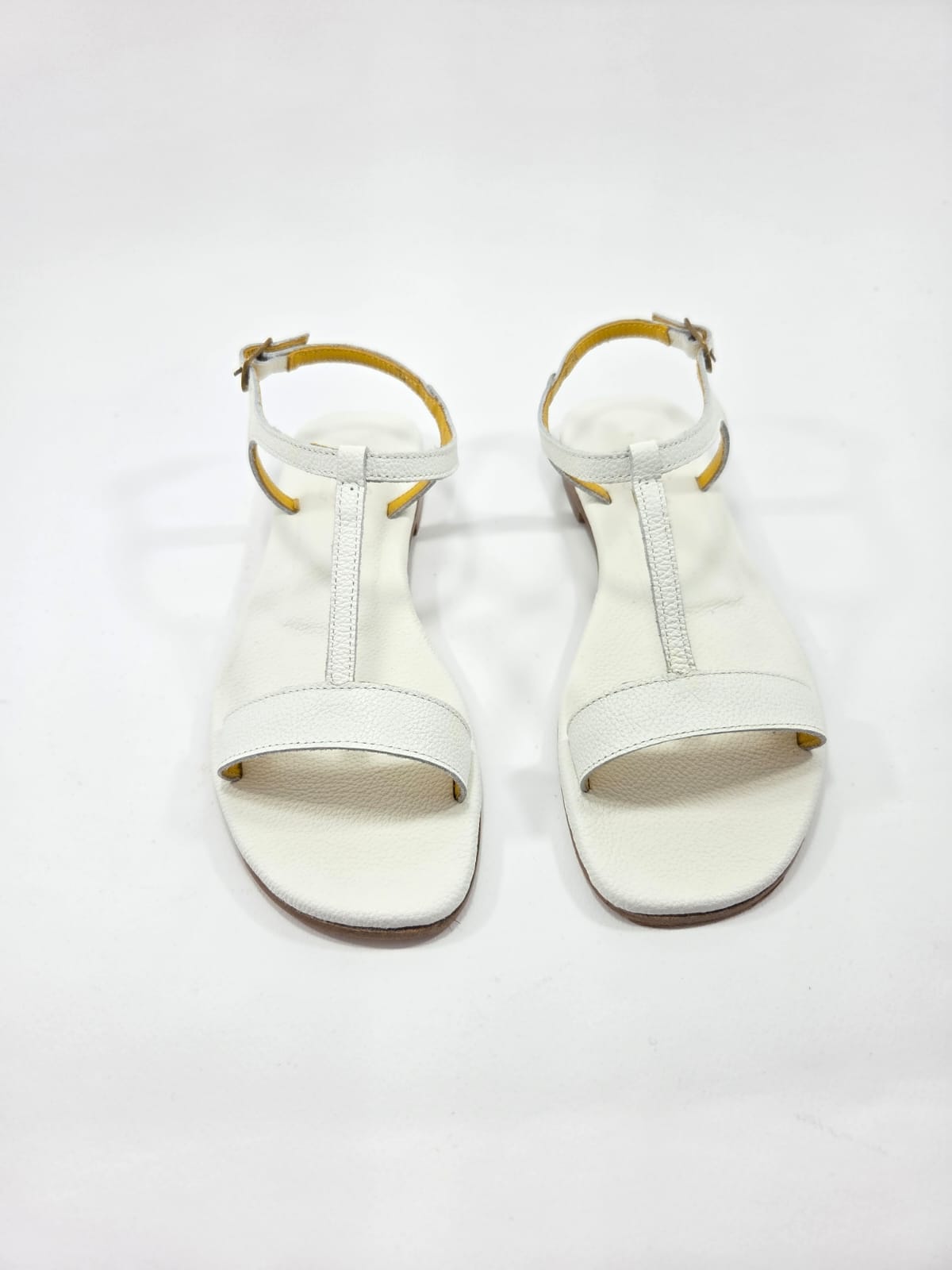 Sandali Donna con Cinturino Interamente in Vera Pelle Bianco con Suola in Cuoio Naturale.