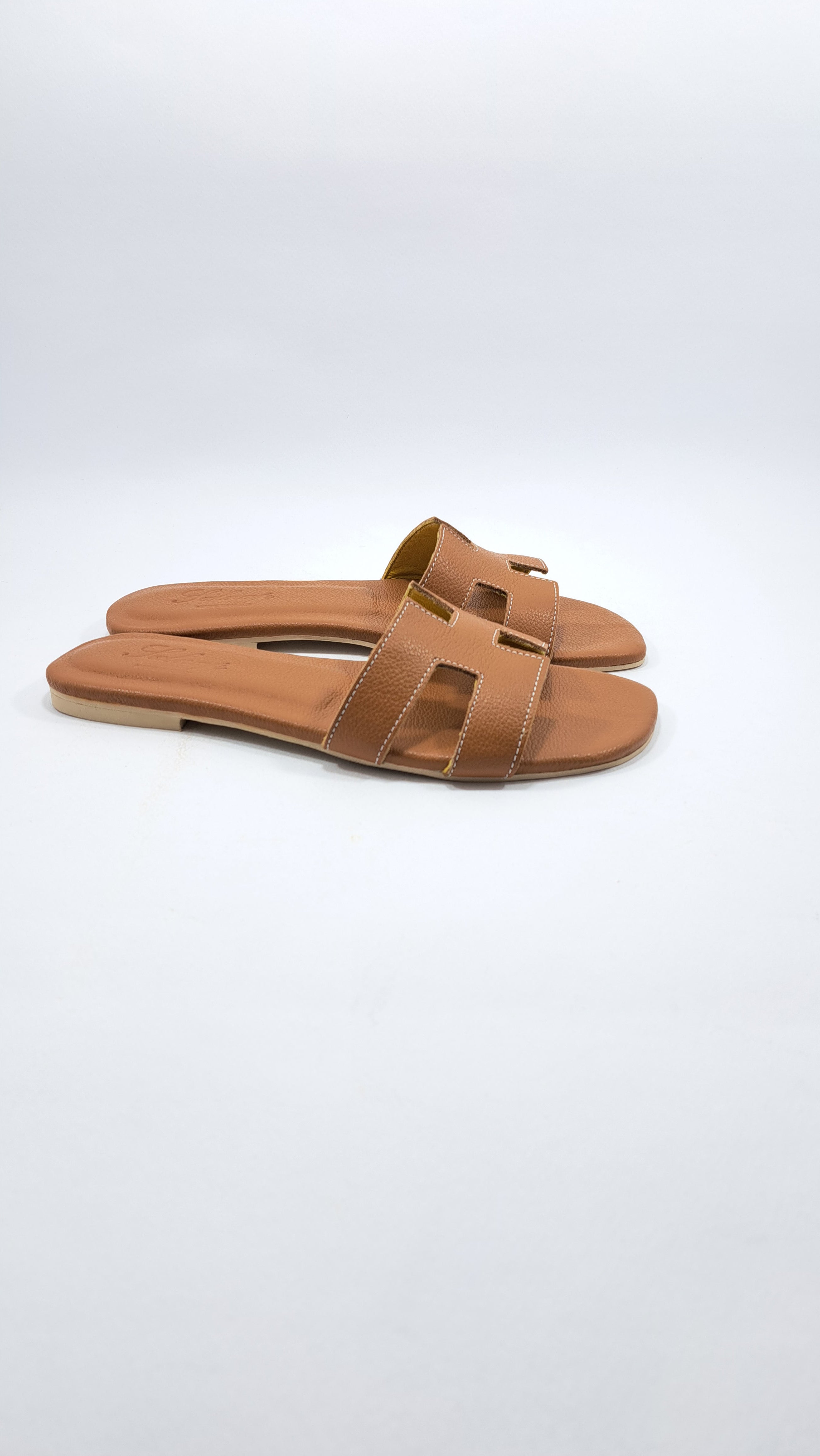 Sandali da Donna Completamente in Pelle. Con suola in Gomma